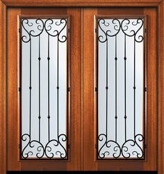 two wooden doors with wrought iron bars and glass panels on each door side by side