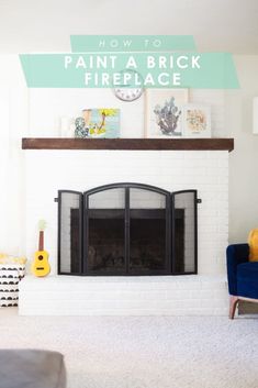 a living room with a white brick fireplace and blue chairs