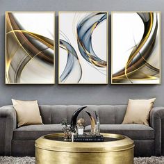 The 'Dynamic Elegance' framed art set is a symphony of fluid motion and metallic grace. Capturing the essence of movement with sweeping golden and silver lines over a neutral palette, this trio of abstract art is a sophisticated addition to any modern space. Each piece, encased in a sleek aluminum frame with shatterproof glass, is printed using UV technology for a lasting impression. These artworks are designed to bring a vibrant yet refined energy to your home or office, perfect for creating an Modern Apartment Living Room, Modern Appartement, Liquid Ink, Nordic Wall Art, Nordic Wall, Living Room Pictures, Modern Apartment, Apartment Living Room, Room Wall Decor