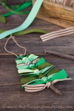 ribbons are tied together on wooden boards and ready to be used as garlands or wall hangings