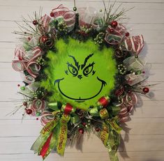 a grin face wreath hanging on the wall