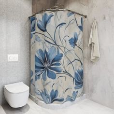 a white toilet sitting next to a blue and white flowered shower curtain in a bathroom