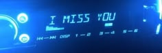 an alarm clock with the words i miss you written on it's display screen