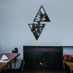 a fireplace in a living room next to a wooden table