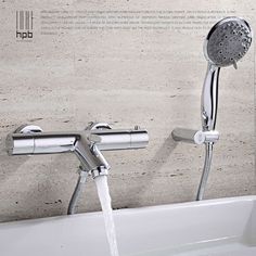 a faucet with water running from it's sides in a bathtub