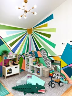 a child's playroom with colorful walls and flooring, including an alligator rug