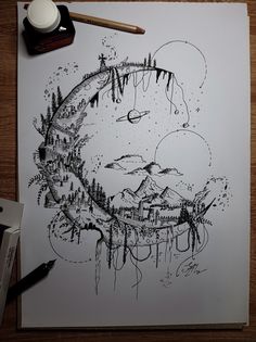 a drawing on paper with some ink and pencils next to it that has been drawn