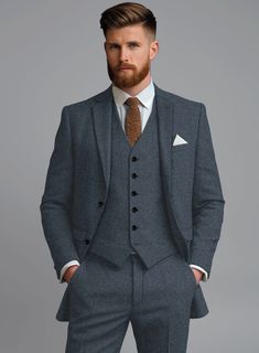 Opt for our Light Weight Bond Blue Tweed jacket and have your evening wear elevated to truly sophisticated style. Crafted from pure wool, tweed jackets are appropriate for colder months as the material not only looks structured and professional but also keeps you warm. Wear it with a matching waistcoat and trousers, a crisp white shirt and dark brown derby shoes.  Look Includes   Light Weight Bond Blue Tweed Fabric  Two Button Jacket Style  Notch Lapel  Horn Royal Black Buttons  Single Vent  Thr Tailored Tweed Jacket With Suit Collar, Fitted Wool Tweed Jacket With Suit Collar, Winter Three-piece Suit With Long Sleeves, Elegant Tailored Tweed Three-piece Suit, Winter Tweed Three-piece Suit, Semi-formal Winter Tweed Three-piece Suit, Winter Semi-formal Tweed Three-piece Suit, Elegant Tweed Blazer For Business Casual, Tailored Tweed Three-piece Suit For Winter