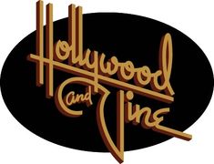 the hollywood and vine logo is shown in gold on a black oval with red lettering