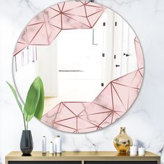 a mirror that is on the side of a dresser next to a potted plant