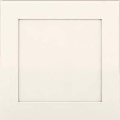 a white square frame on a wall with an empty space for the image to be taken