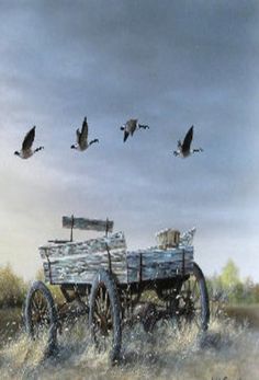 an old wagon with birds flying over it in the sky and on the ground behind it