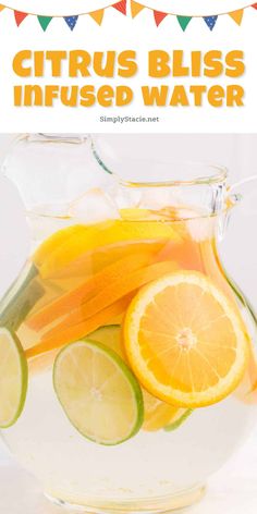 citrus infused water in a pitcher with sliced lemons and lime