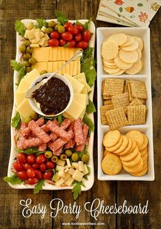 an assortment of cheeses, crackers and fruit on a platter with the words easy party cheeseboard