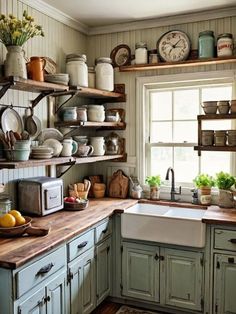 a kitchen filled with lots of open shelving next to a sink and counter top