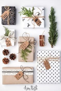 presents wrapped in brown paper and tied with twine, pine cones and evergreen branches