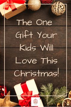 the one gift your kids will love this christmas is on display in front of a wooden background