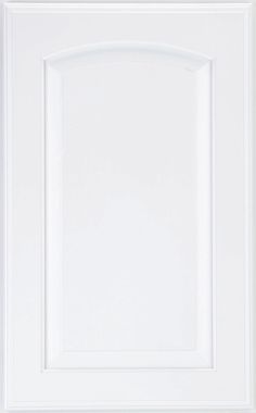 a white kitchen cabinet door with an arched design