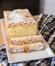 two slices of lemon cake on a white plate