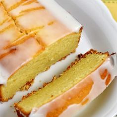 two slices of cake sitting on top of a white plate