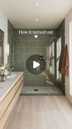 a bathroom with green tile and wood floors, including a walk - in shower area