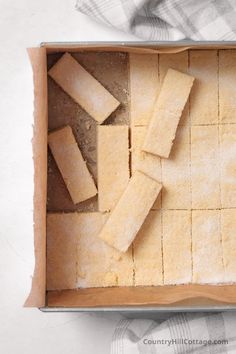 a box filled with cut up crackers on top of a table