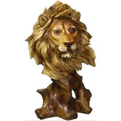 a statue of a lion wearing a crown on its head and mane, sitting on top of a piece of wood