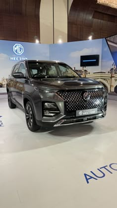 an suv is on display at the auto show