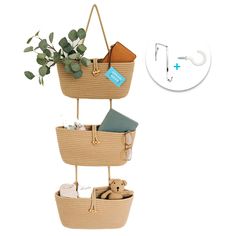 three tiered baskets with plants and baby items in them, hanging from hooks on the wall