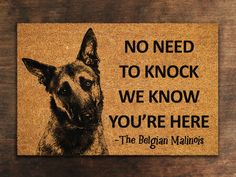 a door mat with a german shepard dog on it that says, no need to knock we know you're here