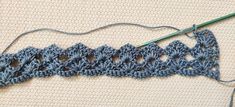 the crochet stitch is being worked on