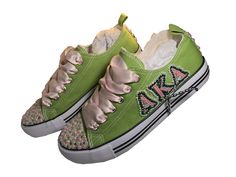 AKA  Alpha Kappa Alpha Sorority Paraphernalia Low Top Sneaker. You can add your name to the shoe as well. You can choose a different flower and color, size and level of bling. Aka Alpha Kappa Alpha, Sorority Paraphernalia, Alpha Kappa Alpha Sorority Paraphernalia, Alpha Kappa Alpha Sorority, Alpha Kappa Alpha, Different Flowers, Womens Tie, Tie Shoes, Sorority