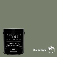 a can of paint with the words magnolia home painted on it and an image of a house