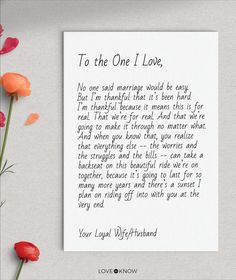 a card with the words to the one i love written on it next to flowers