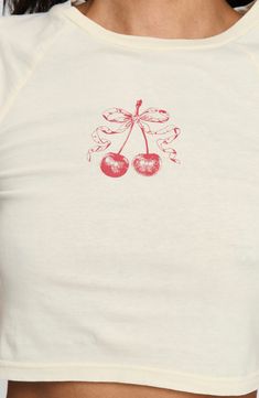 Tasty cherries topped with a bow center a snug-fitting baby tee perfect with your high-waist looks. Crewneck Short sleeves 100% cotton Machine wash, tumble dry Imported Graphic Baby Tee, Baby Graphic Tees, Pink Formal Dresses, Fleece Dress, Sweatshirt Set, Outerwear Outfit, Strapless Tops, Loungewear Sets, Knit Sweatshirt