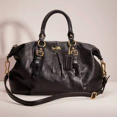 Like New Coach Madison Leather Juliette In Black With Gorgeous Purple Interior. This Bag Is In Pristine Condition. Features Inside Zipper And Pockets As Well As Removable Strap To Be Worn As A Cross Body. Coach Madison Bag, Purple Interior, Bags Coach, A Cross, Coach Bags, Cross Body, Bag Lady, Like New, Zipper