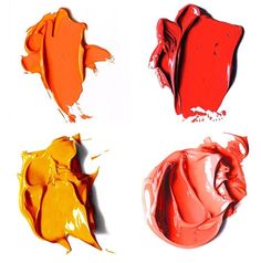 four different shades of orange, red and yellow paint on white paper with one being melted