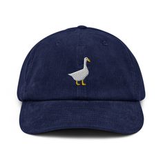 A hat made of corduroy? That's a yes! Get your hands on a hat that'll serve you for ages. The corduroy fabric has stood the test of time thanks to its best features--softness, affordability, and durability.  This goose hat is perfect for any time of year or gifts! * 100% cotton corduroy * Soft, unstructured crown * Cotton twill sweatband and taping * Adjustable buckle This product is made especially for you as soon as you place an order, which is why it takes us a bit longer to deliver it to you. Making products on demand instead of in bulk helps reduce overproduction, so thank you for making thoughtful purchasing decisions! Corduroy Hat With Embroidered Logo And Curved Brim, Adjustable Corduroy Hat With Embroidered Logo, Corduroy Hat With Curved Brim, One Size Corduroy Cap, Adjustable Corduroy Hat With Curved Brim, Goose Hat, Embroidered Corduroy, Corduroy Cap, Corduroy Hat