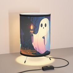 a lamp that has a ghost on it