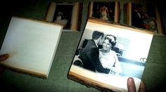 an old photo is being held up to show the couple's wedding pictures