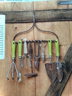 there are many different tools hanging on the wall