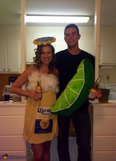 a man and woman dressed up in costumes