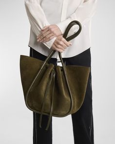 Proenza Schouler ruched tote bag in suede and leather     Rolled shoulder straps, 10"L    Drawstring and magnetic closures     Interior, leashed zip pouch bag    Approx. 7.4"H x 19.6"W x 10.6"D    Leather method dry cleaning    Made in Italy Proenza Schouler, Wedding Shoes