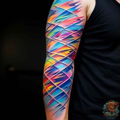 a man's arm with an abstract tattoo design on the left arm and shoulder