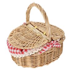 a wicker basket with a red and white checkered cloth on the bottom is shown