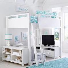 a white bunk bed sitting in a bedroom next to a tv on top of a dresser