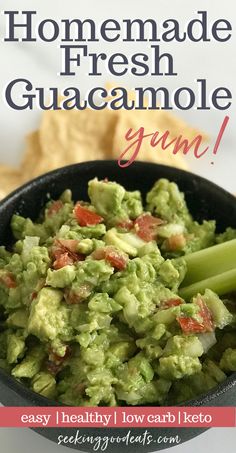 a bowl filled with guacamole and celery