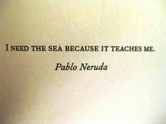 an old typewriter with the words i need the sea because it teaches me pueblo neruda