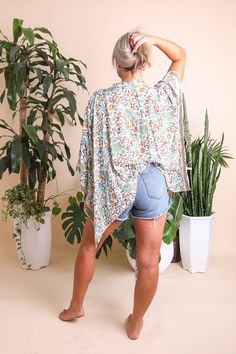 This flattering lightweight versatile floral cuteness is the perfect casual coverup for summer outings. Just pop a bathing suit and a straw sunhat, and you're ready to go! #lovemyleto 100% Viscose Imported Beachwear Tops With Upf 50+ For Beach, Beachwear Tops With Upf 50+ Protection, Beachy Upf 50+ Tops For Spring, Upf 50+ Beach Tops, Beachwear Tops With Upf 50+ For Vacation, Printed Summer Cover-up For Day Out, Beachy Boho Print Cover-up For Vacation, Summer Tops With Upf 50+ For Poolside, Beachy Tops With Upf 50+ For Vacation