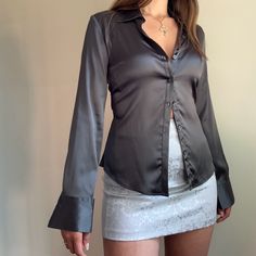 Dark Grey Silk Button Down Blouse. Size 6 98% Silk, 2% Elastic Nwt Elegant Button-up Tops For Date Night, Fitted Blouse With Back Button Closure For Party, Fitted Party Blouse With Back Button Closure, Button-up Tops For Date Night, Collared Blouse With Back Button Closure For Night Out, Fitted Collared Blouse For Date Night, Chic H&m Button-up Shirt, H&m Button-up Blouse With Button Closure, Fitted Collared Top For Date Night